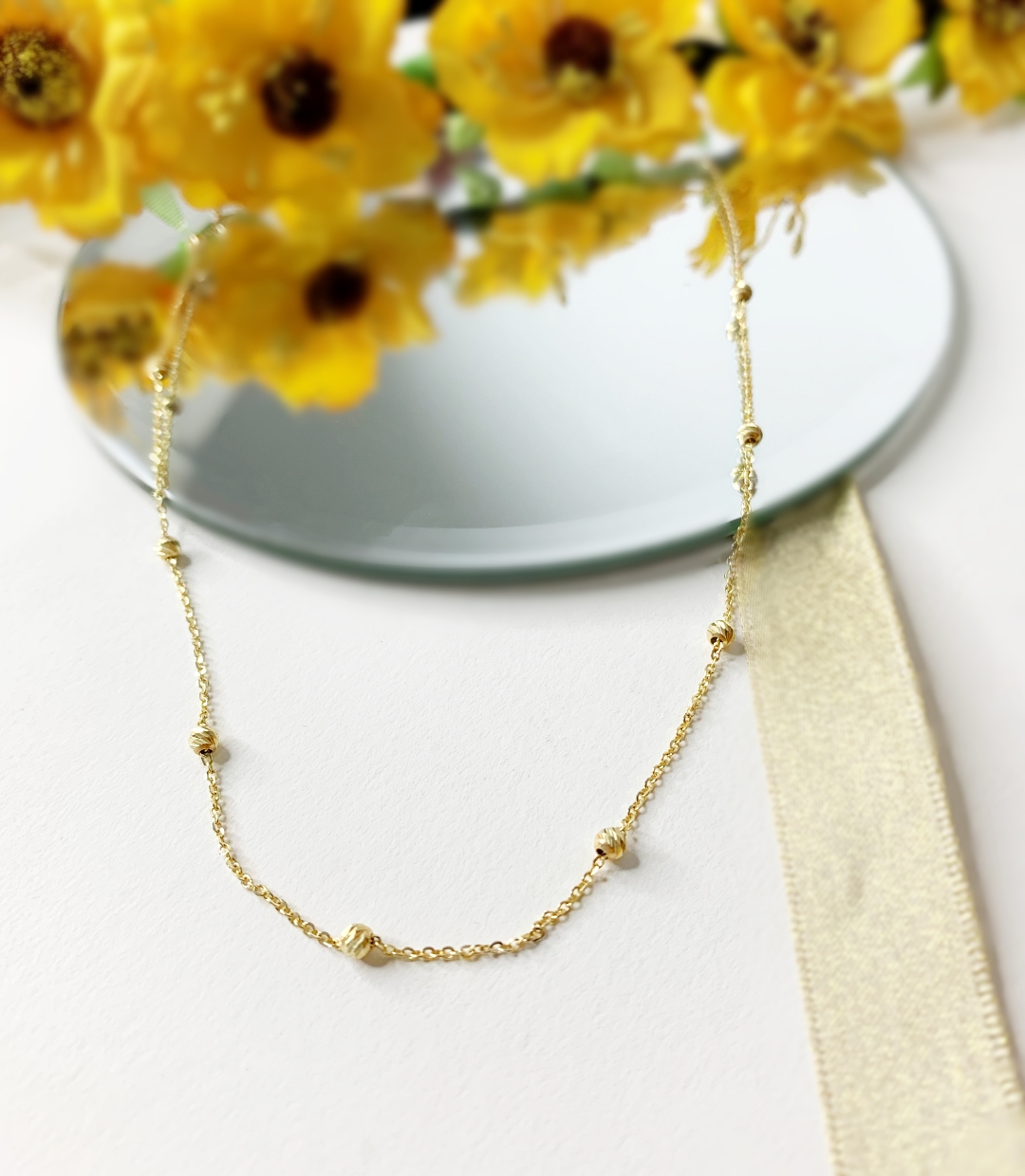 Lantisor cu bilute fixe model diamantat aur galben 14K Rubinul